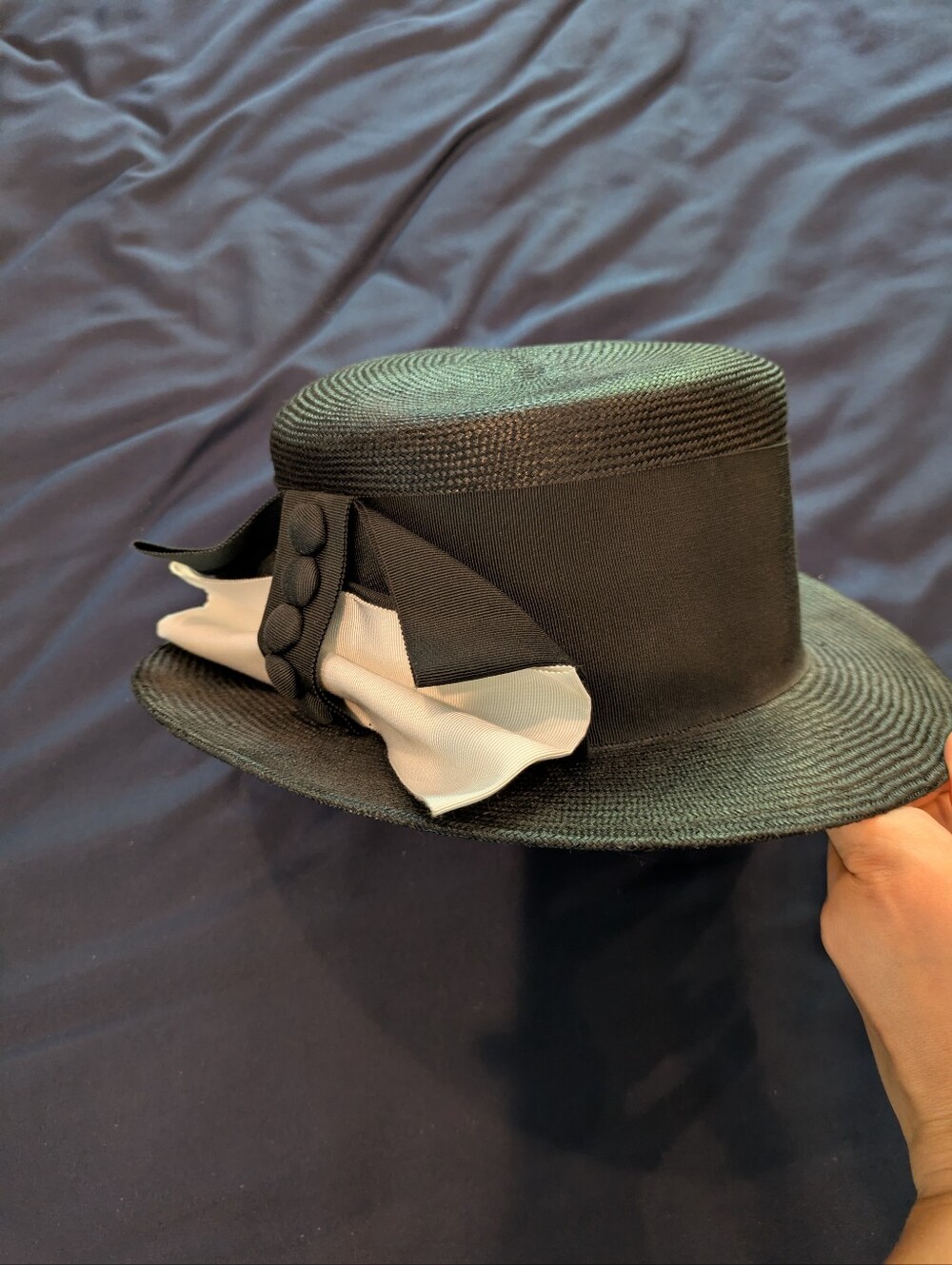 Black Straw Boater Hat with Cream Bow Accent